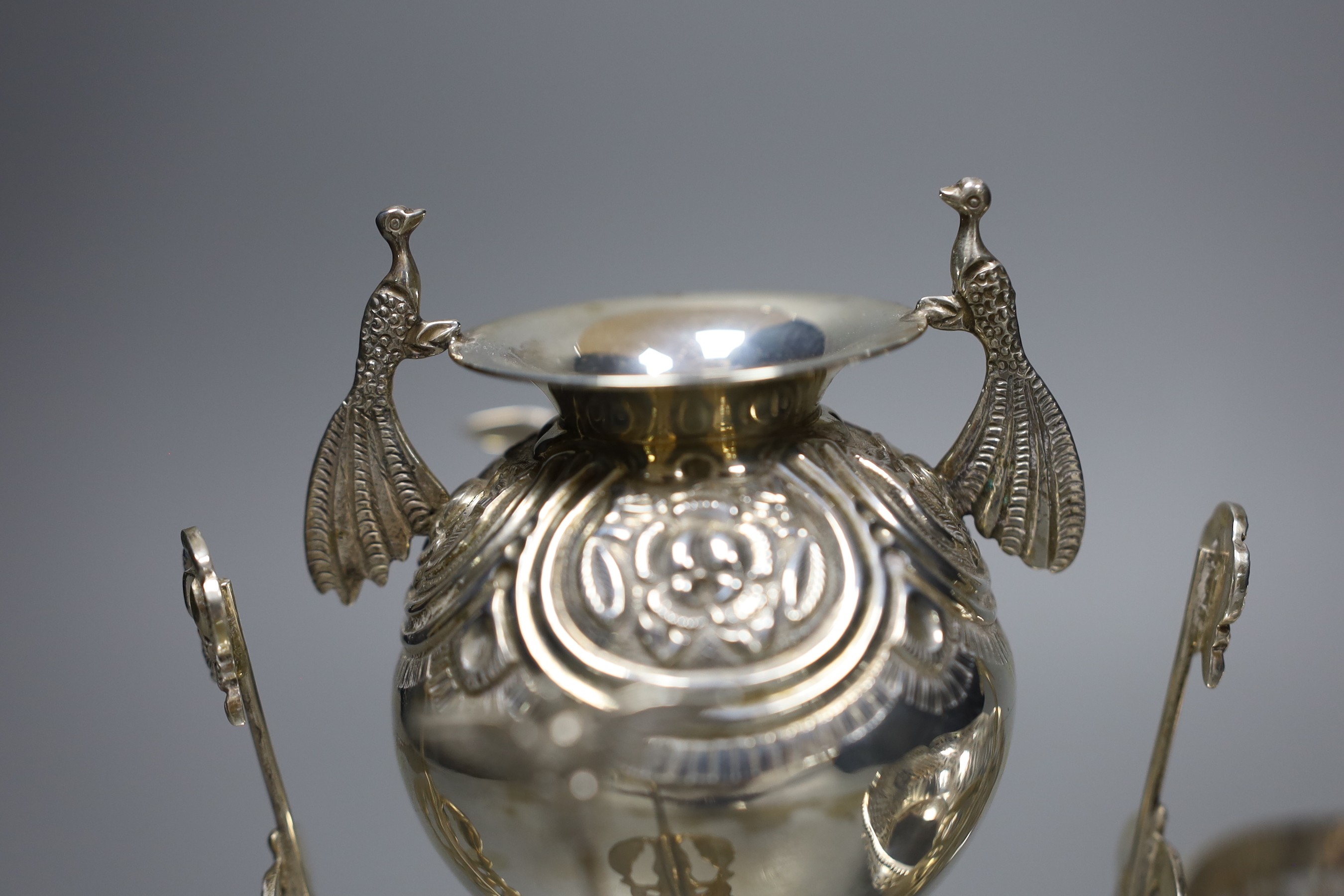 A Chilean .900 silver centrepiece, 18cm., and a pierced white metal basket